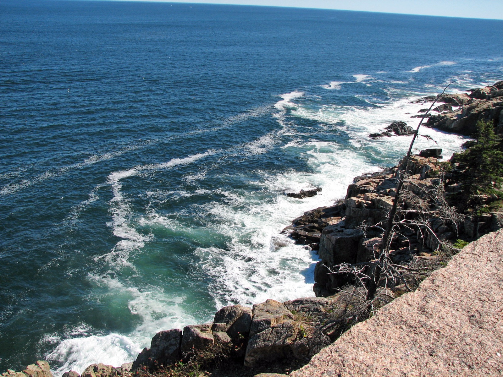 Waves breaking against granite cliffs at Otter Cliff, Acadia National Park, Maine